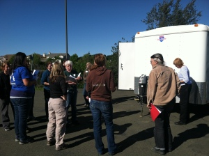 Field Stabilization personnel meet prior to setting up the MASH trailer
